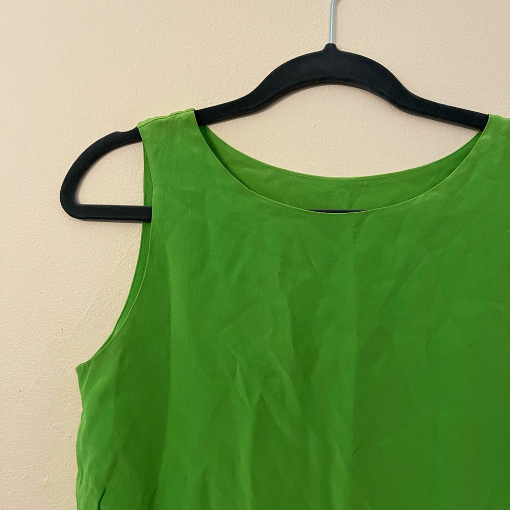 Used but good. Beautiful color and satin fabric